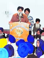 Chief Minister Parkash Singh Badal addresses SGPC members at Teja Singh Samundari Hall in Amritsar