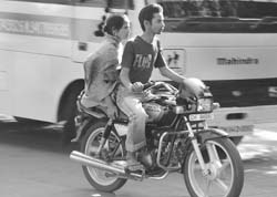 Youths driving without helmets is a common sight in Chandigarh