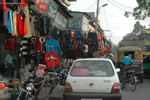 Vehicles crawl due to enchroachment by local shopkeepers at Ballabhgarh main market near Faridabad.