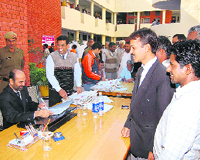 Chief Judicial Magistrate, Fatehabad, Lal Chand presides over a lok adalat in the district courts in Fatehabad on Saturday.
