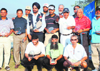 The winners and runners-up are all smiles at the conclusion of the Chandigarh Golfing Tour for NRIs at the Panchkula Golf Club on Sunday.