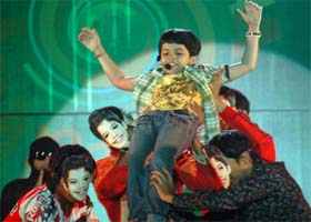 Darsheel Safary (centre) performs during a laughter programme, Ha Ha Hungama, held at Leisure Gardens, Gurgaon on Saturday night