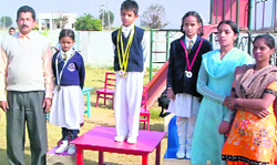 Principal G. A. Joseph distributes prizes to winners.