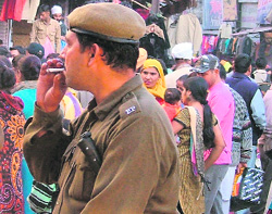 Ban up in smoke: A cop enjoys a puff at a public place in Ludhiana