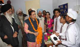 Chief guest Dr Harshinder Kaur speaking to speech and hearing impaired children at the Navjeevan School at the Teachers Home in Bathinda on Monday. Also seen is chairman of the Minority Society Malkiat Singh.