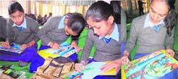 Students take part in a poster-making contest at Jat Bhavan in Chandigarh 