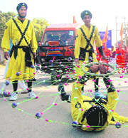 Sikh martial arts Gatka being performed on the occasion of the Martyrdom Day of Guru Teg Bahadur in Dehradun on Monday.