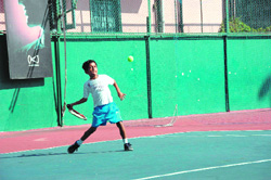A match in progress at the inter-school tennis tournament being played in Dehradun 
