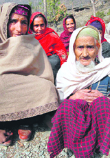 In a rare case, an elderly woman, 80-year-old Haseena Begum (right), hailing from Kangan constituency in Ganderbal, sporting a beard in Srinagar on Monday.
