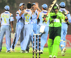ICL Indias player celebrate the fall of a wicket against ICL Pakistan in Ahmedabad on Monday.