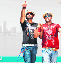 Abhishek and John share a gay moment in Dostana.