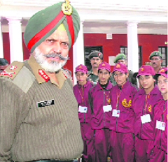 IMA Commandant Lt -Gen Rajinder Singh Sujlana with Kashmiri students.