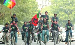 Working street children from Bornfree Art School International on a bicycle ride from Banglore to Lahore, called Peace by cycle to raise awareness of child labour across India, in New Delhi