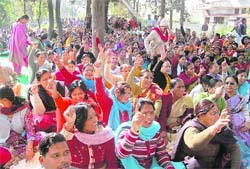 Teachers from Haridwar and Dehradun districts stage a protest outside the Vidhan Sabha in Dehradun on Tuesday.