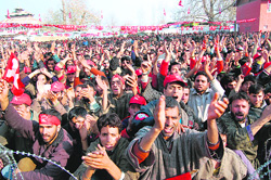 Supporters of the National Conference during an election rally of the party president, Omar Abdullah, at Handwara in Kupwara in Srinagar 