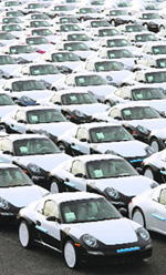 This file photo shows Porsche 911 cars parked at the harbour of the northern town of Emden before being shipped abroad. CEO of German luxury carmaker Porsche Wendelin Wiedeking announced the company's 2007/2008 results on Wednesday in Stuttgart and said Porsche pushed back its planned takeover of Volkswagen as it revealed that the global slowdown was hitting hard sales of its highly priced sportscars. 