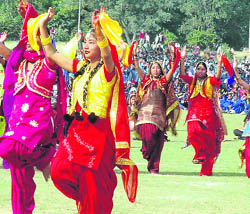 Schoolgirls perform during the inauguration of the 54th National School Games in Patiala on Wednesday.