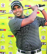 Rahul Ganapathy completes a swing as he leads on the opening day of the Haryana Open at the Panchkula Golf Club on Wednesday.