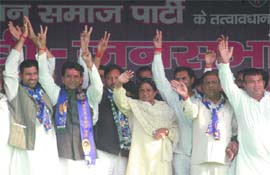 UP Chief Minister and BSP president Mayawati with her party candidates during an election rally at Sultanpur in New Delhi on Wednesday. 