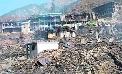 Remaining 17 houses which escaped the fury of fire in Solang village, about 13 km from Manali. 