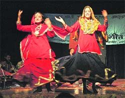 Artistes present a folk dance at a function organised by the All-India Radio in Shimla on Wednesday. 
