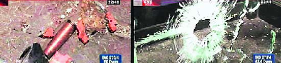 Television pictures show scattered pieces of vehicles and a shattered window at the Central Shivaji Terminus after a group of terrorists caused mayhem in Mumbai.