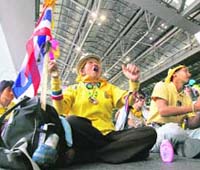 Pro-democracy supporters squat at Thailands main airport 