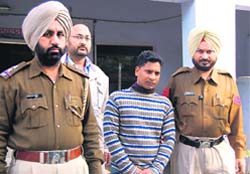One of the accused in police custody in Ludhiana