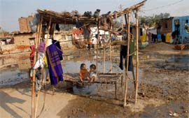 Children in Beant Singh Nagar play amidst overflowing sewage water unaware of the health hazards it can cause in Bathinda. 