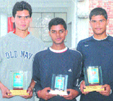 (From left) Kanwardeep Singh Kang, Sukhdanish Singh Behl and Thakur Ajay Singh pose with their trophies.