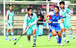 Players of MP Academy of Gwalior and Rail Coach Factory, Kapurthala, in action in the opening match of hockey tournament in Ludhiana on Thursday.