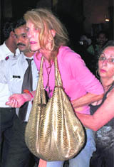 A guest of Taj Mahal hotel after being rescued on Thursday.
