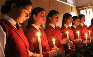 Paying tribute: Girls of the SSD High School pay homage to those killed in terrorist attacks in Mumbai by lighting candles in Bathinda on Friday.