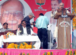 Senior BJP leader L.K. Advani (left) addressing an election rally in Hanumangarh district of Rajasthan.