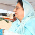 PPCC president Rajinder Kaur Bhattal addressing a rally in Santpura village of Sangria constituency on Friday.