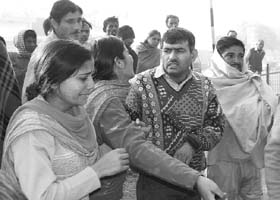 Wailing family members of Preeti, who was killed in a road accident near grain market, in Ambala City