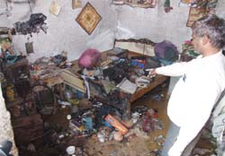 The state of a house that caught fire at Firoz Gandhi Colony in Gurgaon following an LPG cylinder leak 