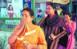 Bereaved family members of Malayesh Banerji after his body was brought at Birsa Monday Airport in Ranchi on Friday. Malayesh, an executive in Reliance Urban Infrastructure Venture Company, was gunned down by terrorists in Mumbai