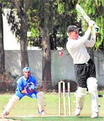 Players in action during a cricket match organised for the mentally challenged at Government Model Senior Secondary School, Chandigarh,