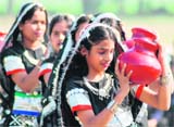 Students of Nishan Public School participate in a function on the premises of the institution in Karnal