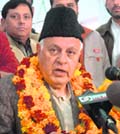 Former Chief Minister and National Conference patron Farooq Abdullah addresses a press conference at the party office in Jammu on Saturday.