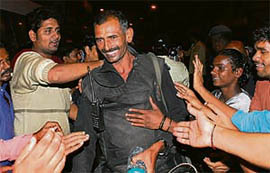 People congratulate an NSG commando in Mumbai.