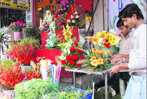 Flowers on display at a shop.