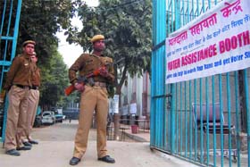 Security personnel guard the counting centre at NP Bengali School, Gole Market in New Delhi constituency