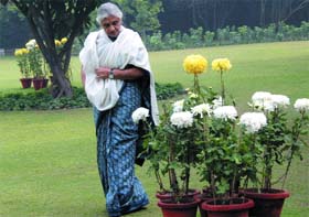 THE DAY AFTER: Delhi Chief Minister Sheila Dikshit walks in the garden of her residence in New Delhi