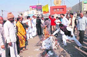 VHP activists burn an effigy of terrorism at Aggarsen Chowk in Hisar on Sunday in protest against the Mumbai terror attacks
