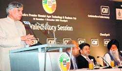 Union minister of state for finance Pawan Kumar Bansal addresses a gathering during the concluding day of the Agro Tech 2008 in Chandigarh on Monday.