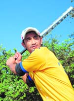 Davinder of SGGS College, who scored one home run, during a league match against DAV College-10 on the Panjab University grounds on Monday. 