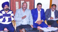 Members of the Rice Millers Association during a press conference in Jalandhar on Monday. 