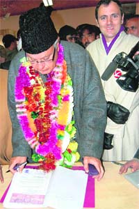 NC patron Farooq Abdullah files his nomination papers from the Hazratbal constituency in Srinagar